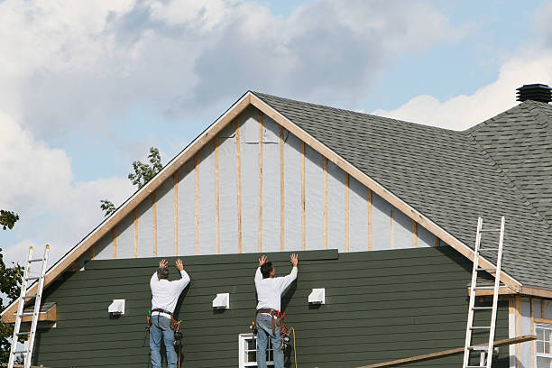 Professional Emergency Siding Repair technician working in West College Corner, IN